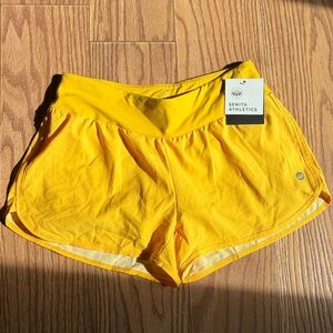 Senita Shorts size small yellow lined ladies athletic shorts